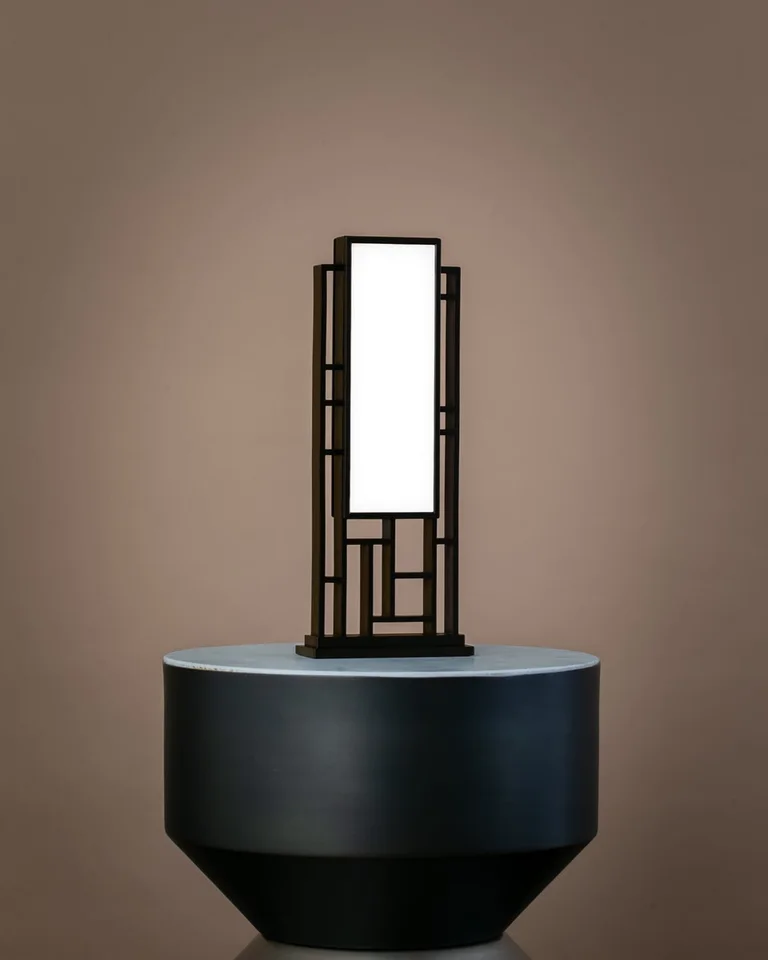 White geometric Circadian Optics Lattis light therapy desk lamp